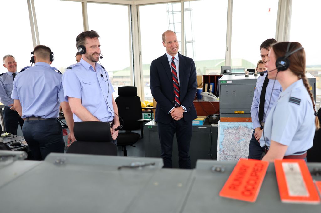 Prince William talks to base personnel inside the Air Traffic Control Tower during an official visit at RAF Valley