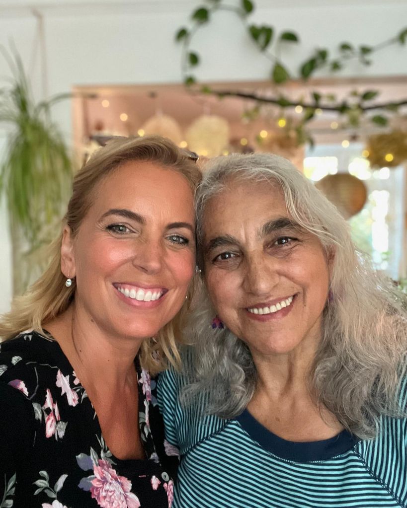 mother posing for selfie with daughter