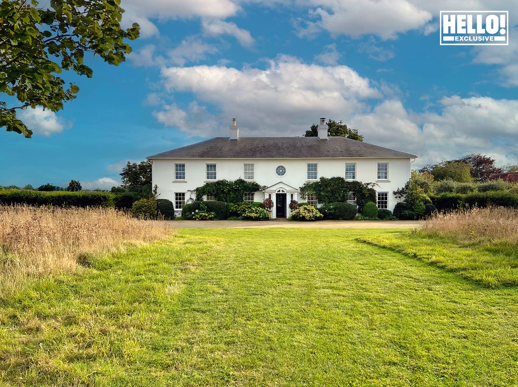 India Hicks at Oxfordshire family home - exterior view of white building and land