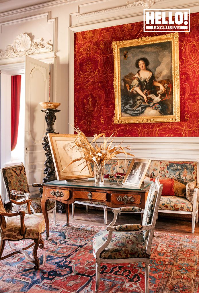 Baron Arnaud De Bastard's red drawing room at Chateau de Saint-Denis