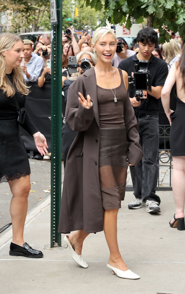 Iris Law is seen arriving at the Calvin Klein fashion show during New York Fashion Week in sheer skirt