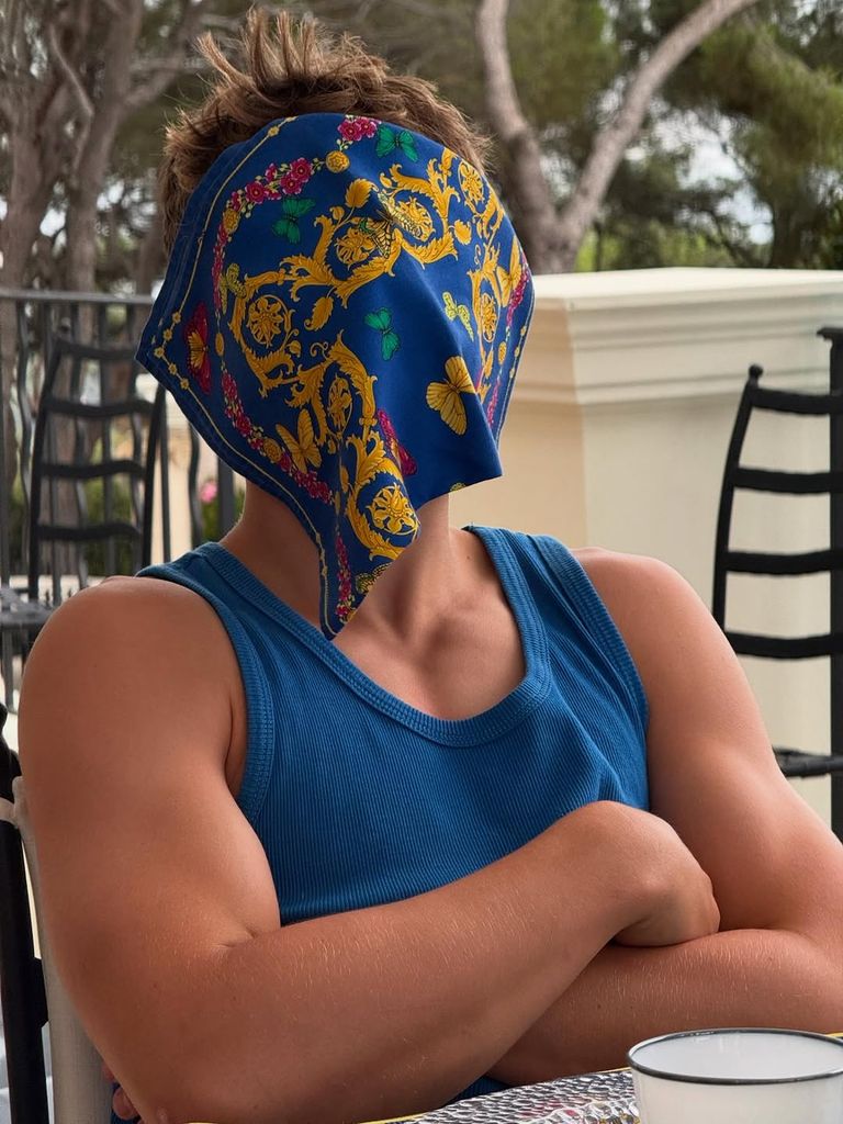 Elton John posted pictures of his rarely seen sons as the family enjoy their summer break