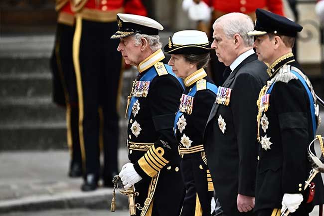 Charles with his siblings at the Queens funeral