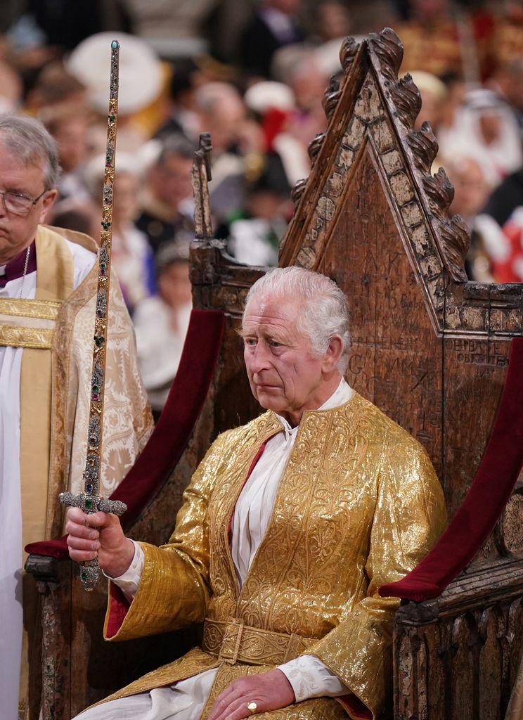The King proudly wore his signet ring during his historic coronation ceremony