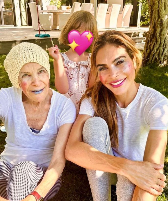 Ayda Field and her mum with their makeup done by a young girl