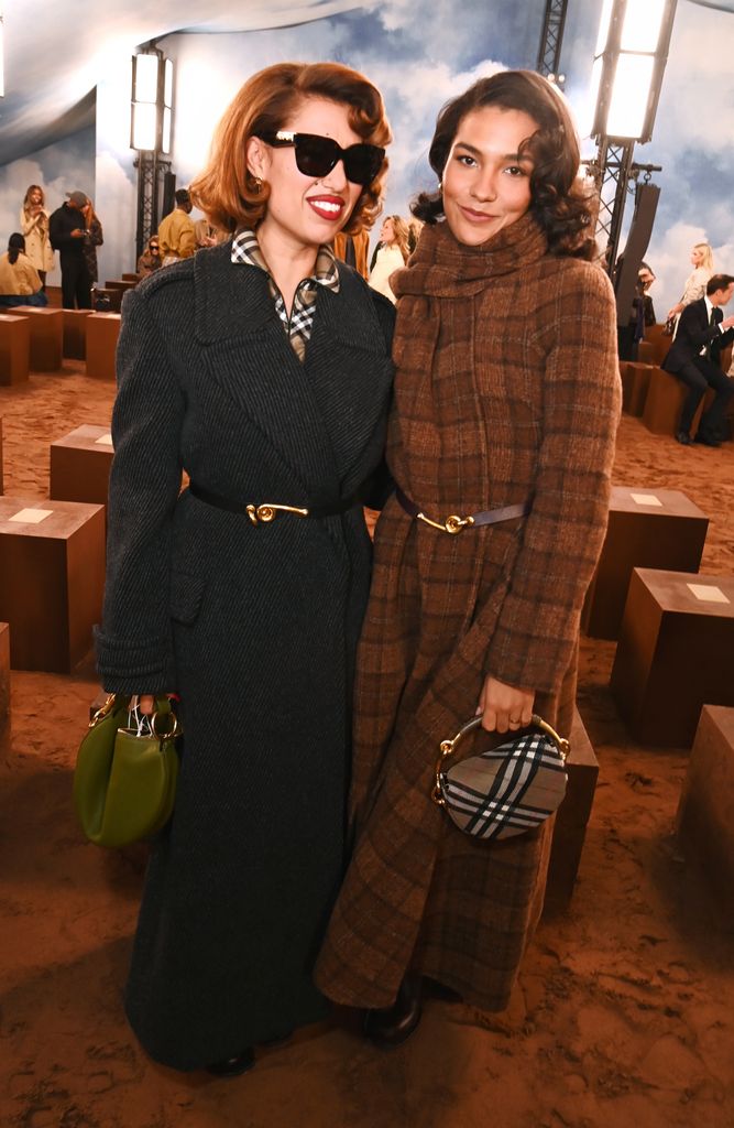 Raye and Olivia Dean attend the Burberry Summer 2026 show during London Fashion Week on September 22, 2025 in London, England