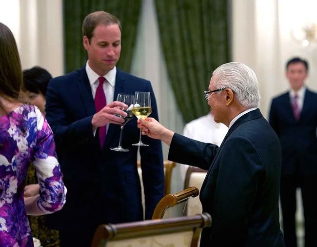 Prince William toasts during South Pacific tour in 2012