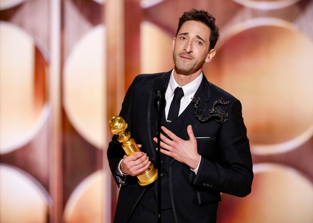 Adrien Brody accepts the award for Male Actor - Motion Picture - Drama at the 82nd Annual Golden Globe Awards at The Beverly Hilton on January 05, 2025 in Beverly Hills, California