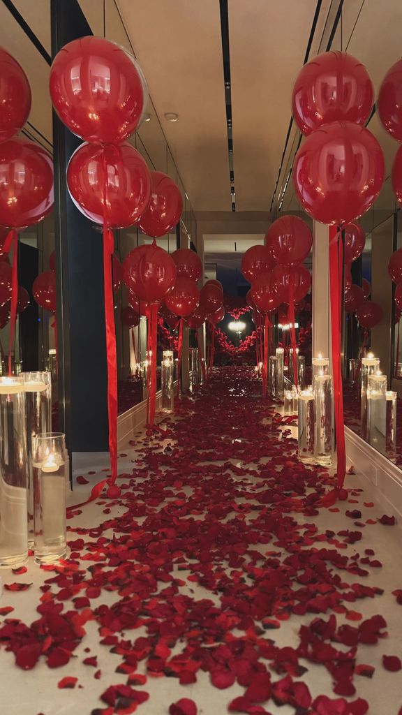 Princess Sheikha Mahra bint Mohammed bin Rashid Al Maktoum walking on rose petals towards a romantic proposal