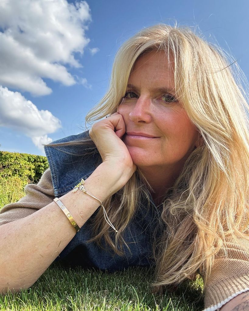 Penny lancaster selfie lying on grass