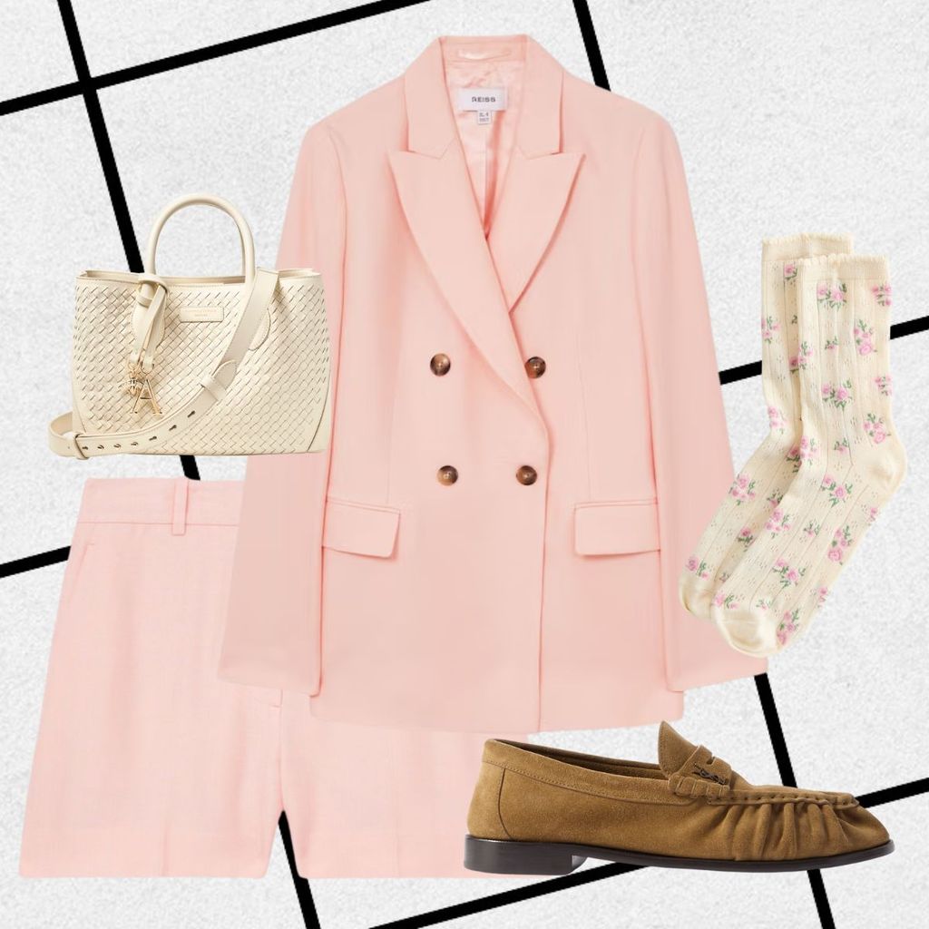 A tailored, pale pink blazer with matching shorts feels structured yet light. Floral socks peek from soft suede loafers. A textured cream handbag and the crisp fabric of the suit create a polished, playful outfit ideal for a dressy spring outing.