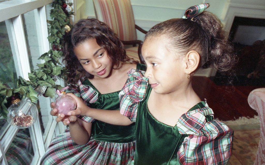 Beyoncé and Solange when they were young children