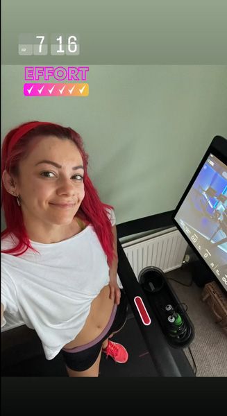 Dianne Buswell standing on a treadmill