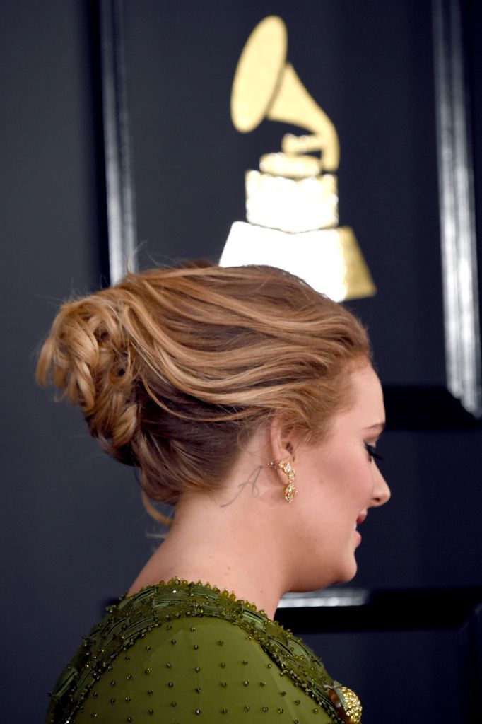 Adele has an 'A' tattoo in tribute to her son, Angelo