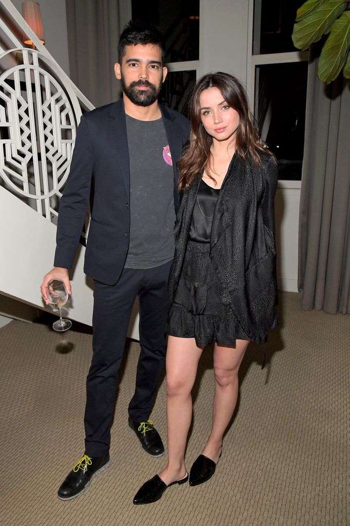 Alejandro Pineiro Bello (L) and Ana de Armas attend the Opening of Beverly Hills Boutique with a private VIP dinner hosted by Giovanni Morelli, Stuart Weitzman Creative Director, and Laura Brown, InStyle Editor-In-Chief at The Sunset Tower Hotel on January 19, 2018 in Los Angeles, California