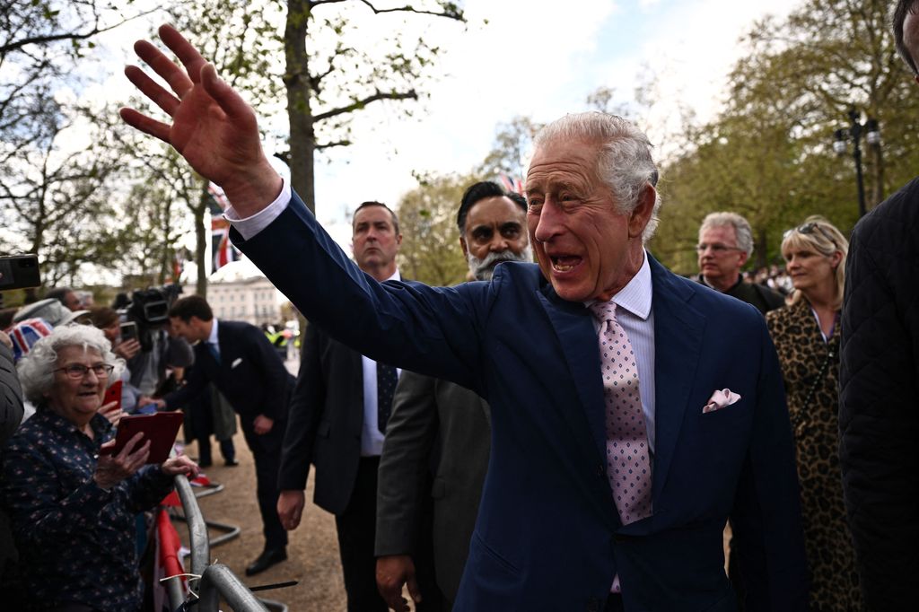 King Charles waving to royal fans