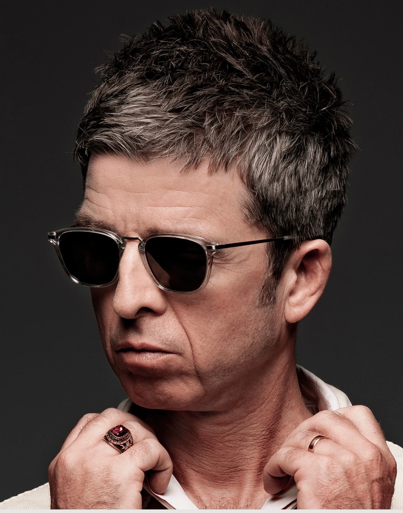 Noel Gallagher poses in sunglasses