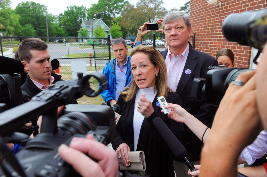 Elizabeth Colbert Busch speaks to media after casting her vote in a special election runoff 
