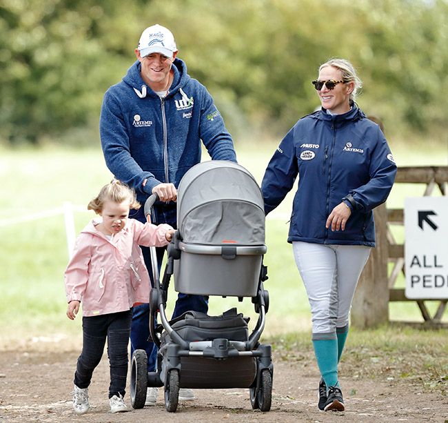 tindall family walking together with buggy