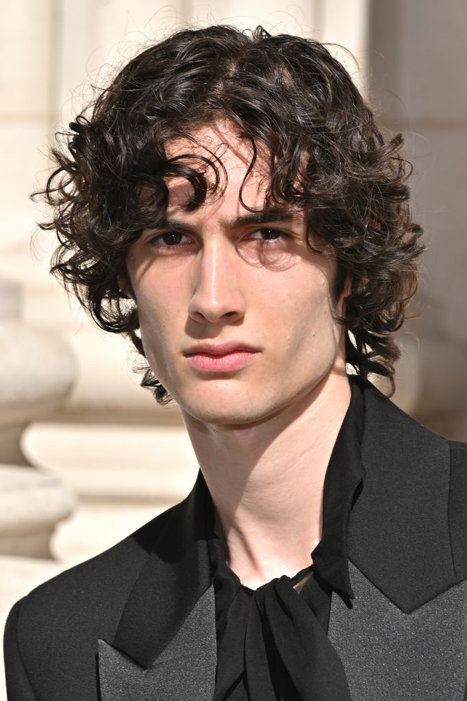 Shane Michael Boose aka Sombr attends the Saint Laurent Menswear Spring/Summer 2026 show as part of Paris Fashion Week