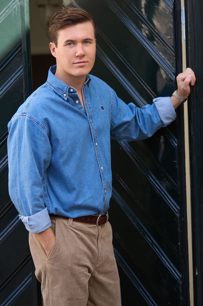 Crown Prince Christian at front door of Amalienborg