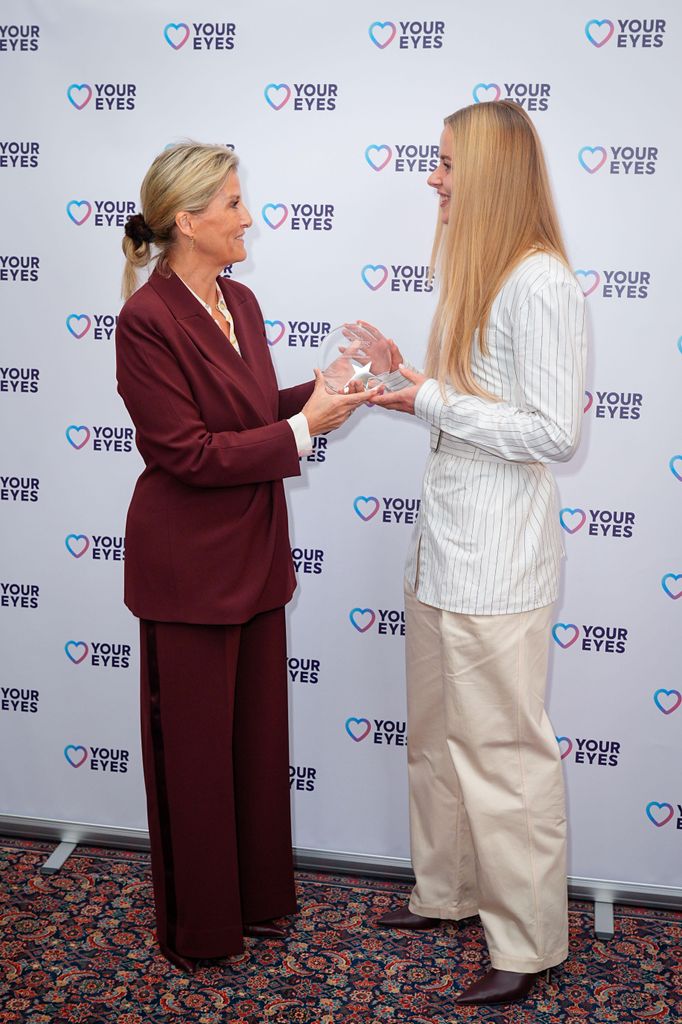 The Duchess of Edinburgh presenting footballer Hannah Hampton with an award