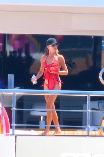 Victoria Beckham wows in red hot bikini alongside shirtless David - see  photos