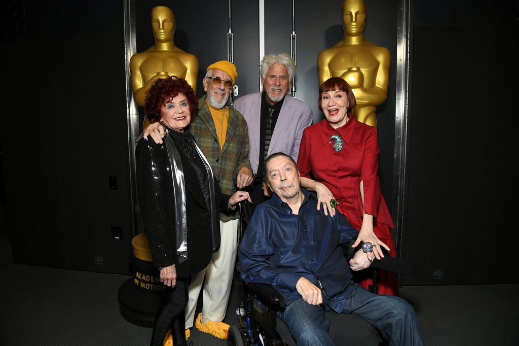 Patricia Quinn, Lou Adler, Barry Bostwick, Nell Campbell and Tim Curry attend The Academy Museum Hosts 50th Anniversary Of "The Rocky Horror Picture Show" With Tim Curry And Sins O' The Flesh at Academy Museum of Motion Pictures, Ted Mann Theater on September 26, 2025 in Los Angeles, California