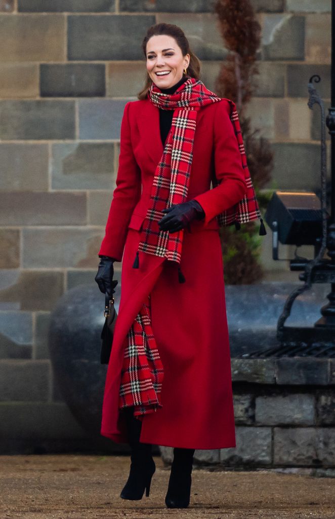 Kate in red coat with tartan scarf