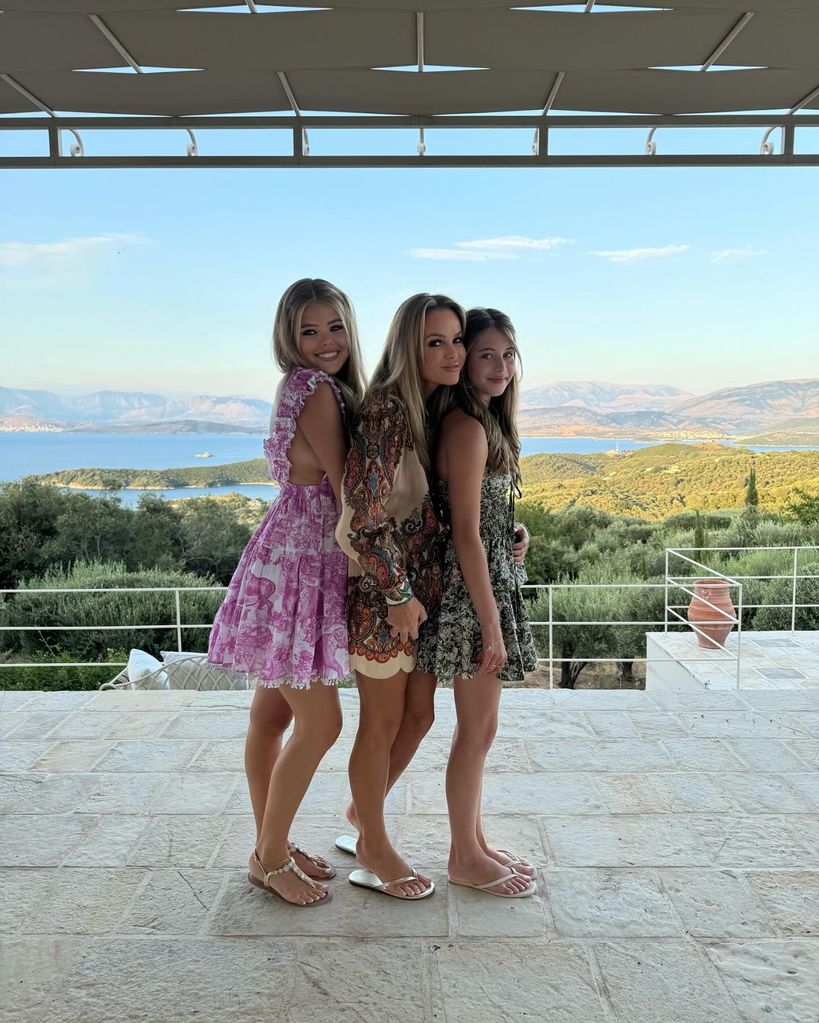 amanda holden posing with two daughters