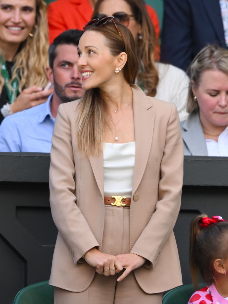 The mother-of-two wore a beige suit on day four of the Wimbledon Championships