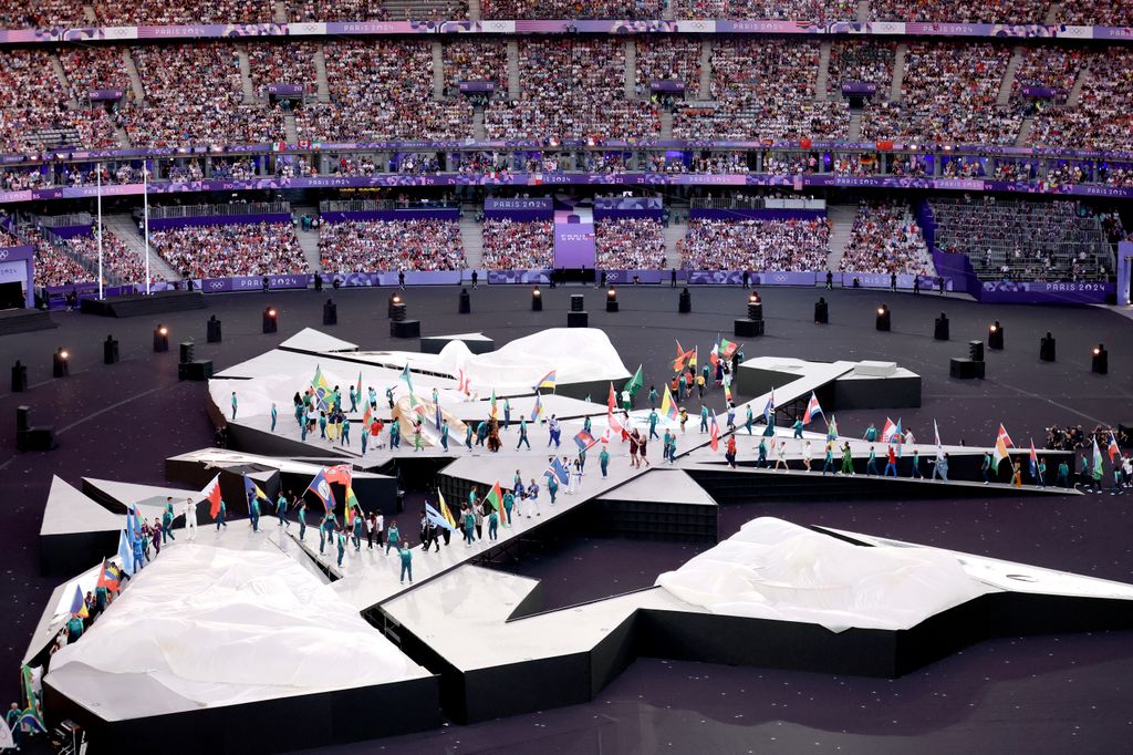 A general view as flagbearers enter the State de France during the Closing Ceremony of the Olympic Games Paris 2024 at Stade de France on August 11, 2024 in Paris, France.