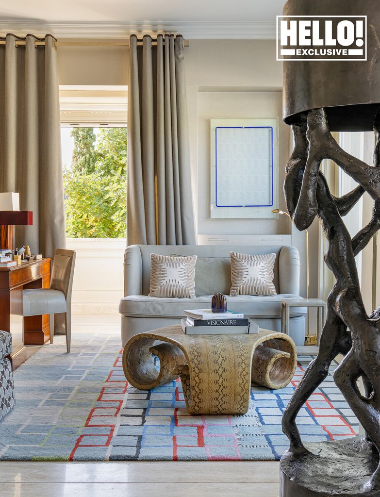 Celia Kritharioti home with quirky coffee table and bronze sculpture lamp