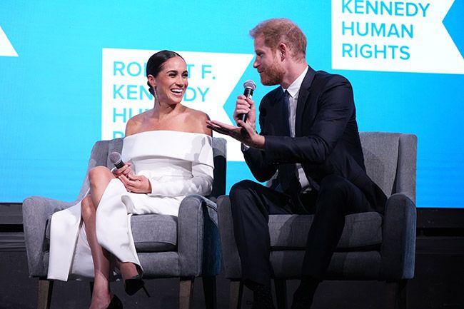 Meghan Markle and Prince Harry on stage