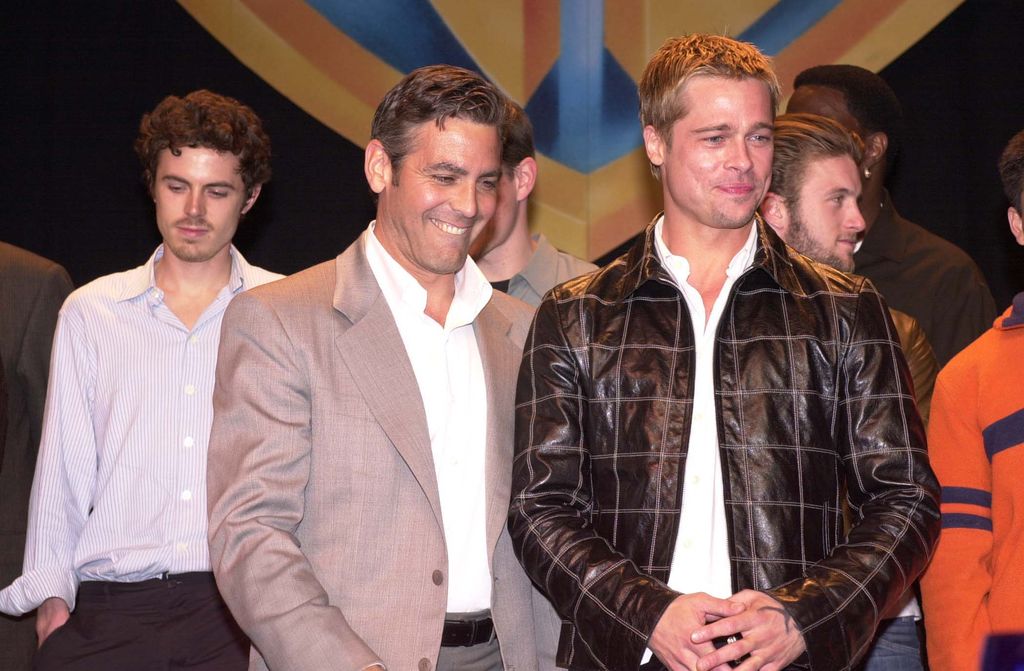 Casey Affleck, George Clooney & Brad Pitt during Showest Warners Lunch. (Photo by Jeff Kravitz/FilmMagic, Inc)