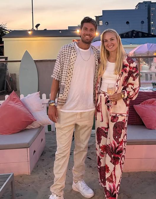 Cameron Norrie and Lousie Jacobi at an outdoor bar