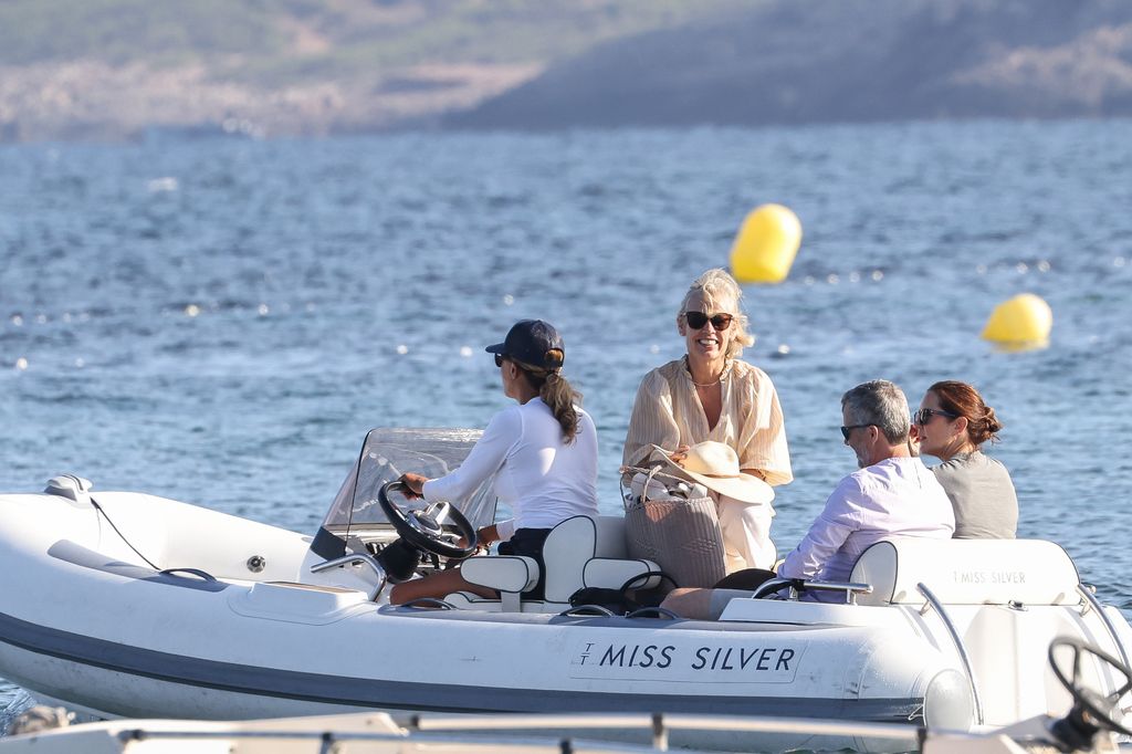 The couple were seen making their way to the yacht on a small boat