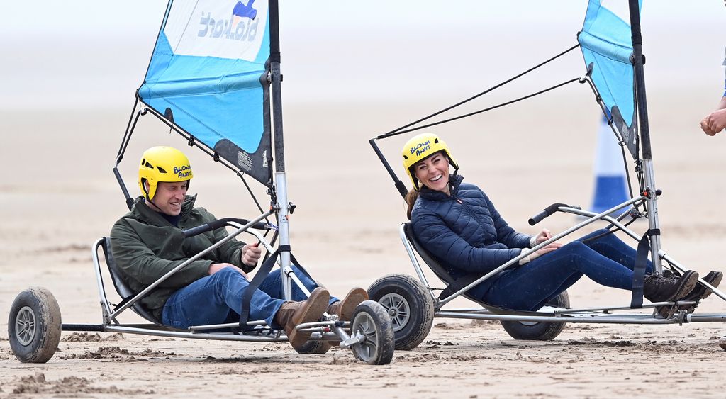 William and Kate laugh as they take part in land yachting in St Andrews, Scotland