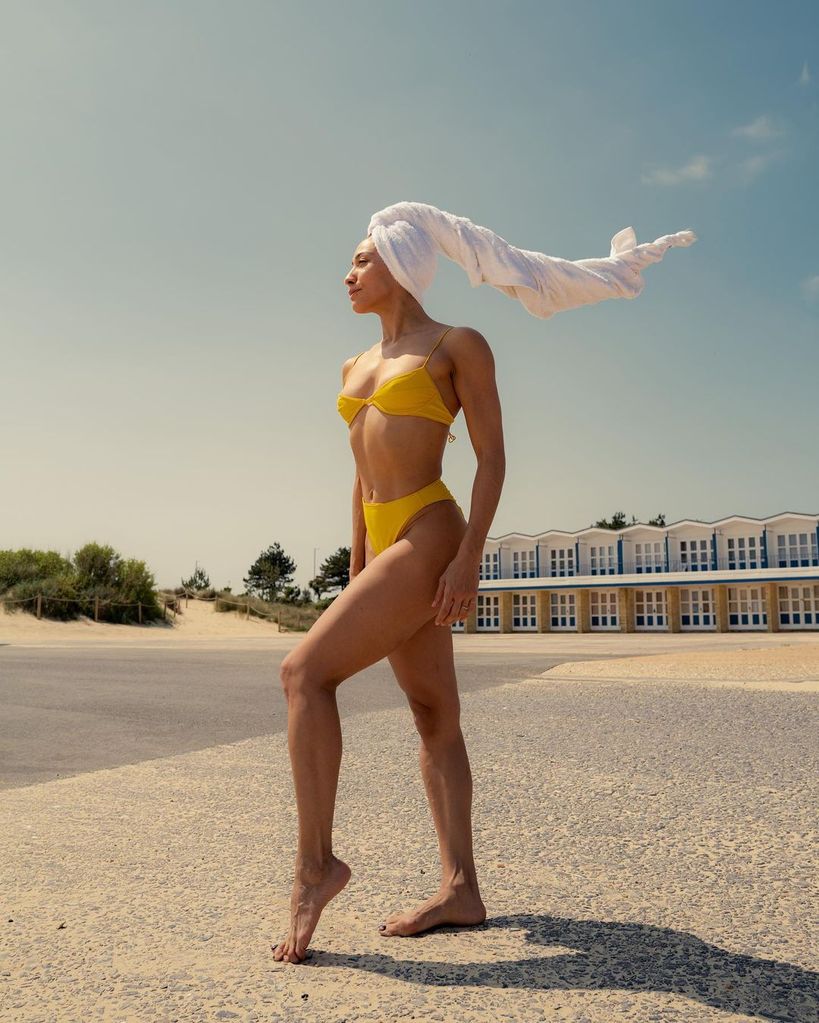 Karen Hauer looking stunning in a mustard string bikini
