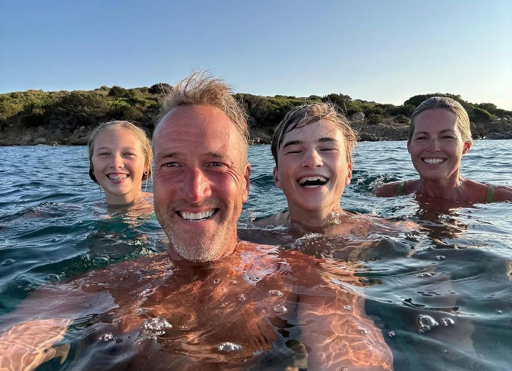 Ben shared a picture of himself, his wife Marina and their two children enjoying the water