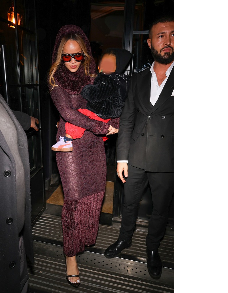 Rihanna carries her son RZA in Paris