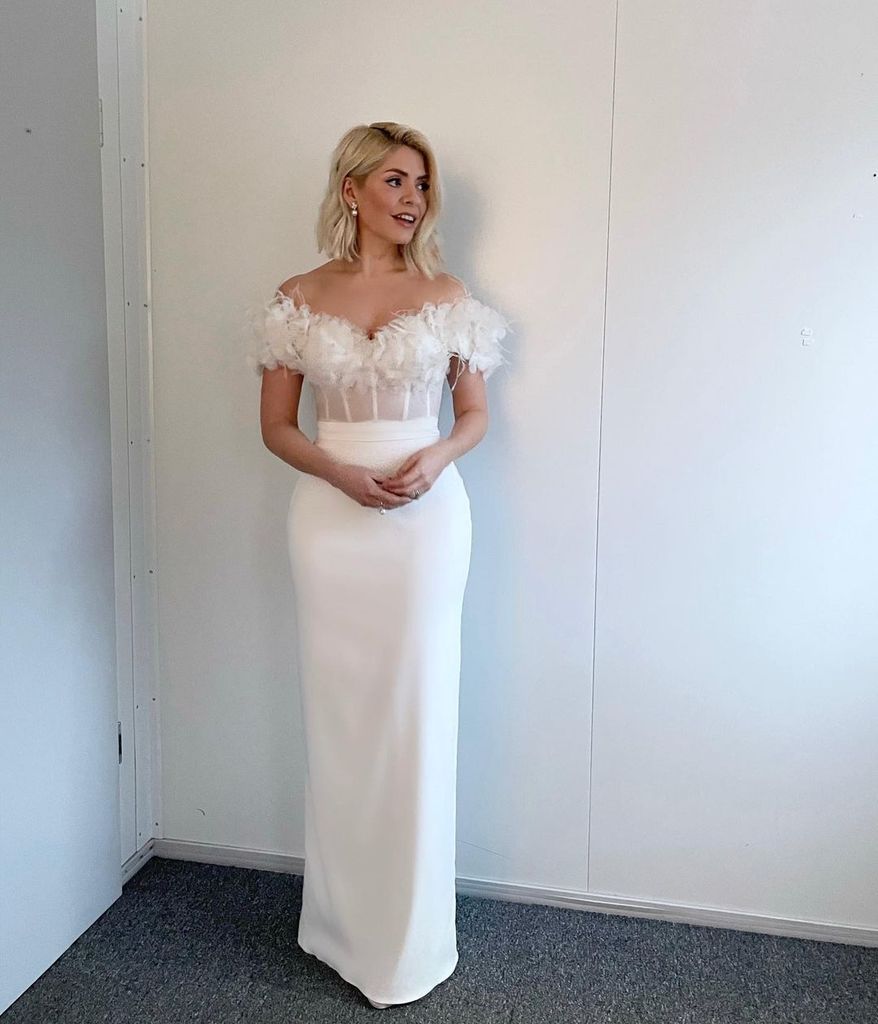 Holly Willoughby in a white feathered dress