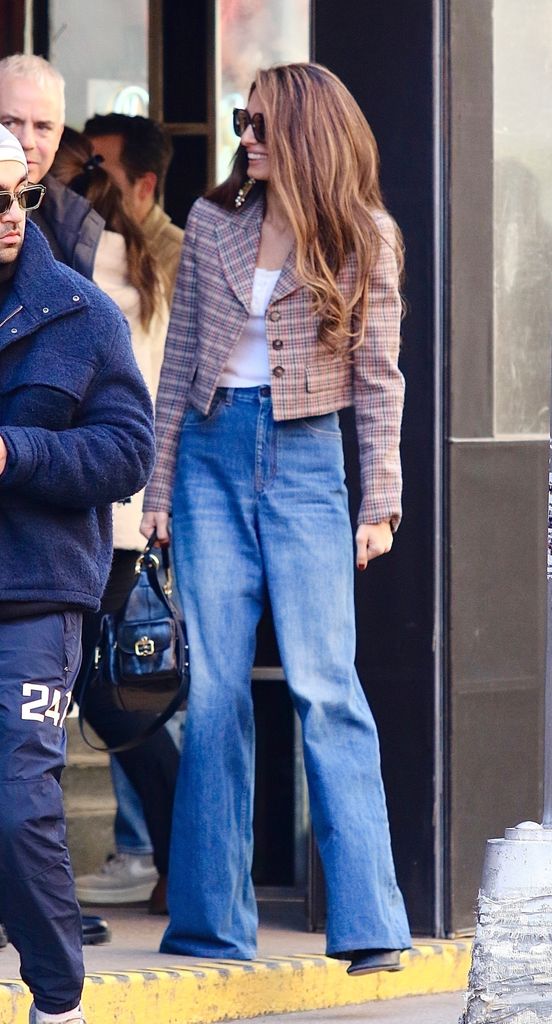 Amal Clooney and her husband Goerge Clooney leave lunch at French restaurant Raoul's with an attorney friend Kevin Johnson in Manhattan's SoHo neighborhood