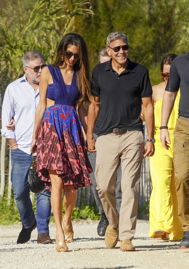 George Clooney and his wife Amal seen walking to La Cabane Bambou on Pampelonne Beach