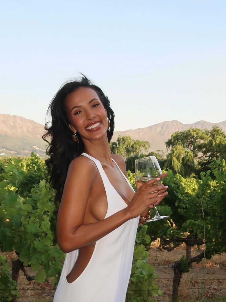 Maya Jama in a white dress