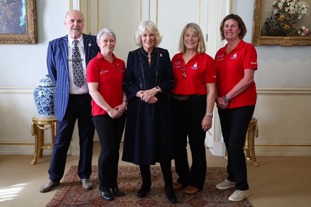 The Queen with members of the original Maiden Yachting Crew