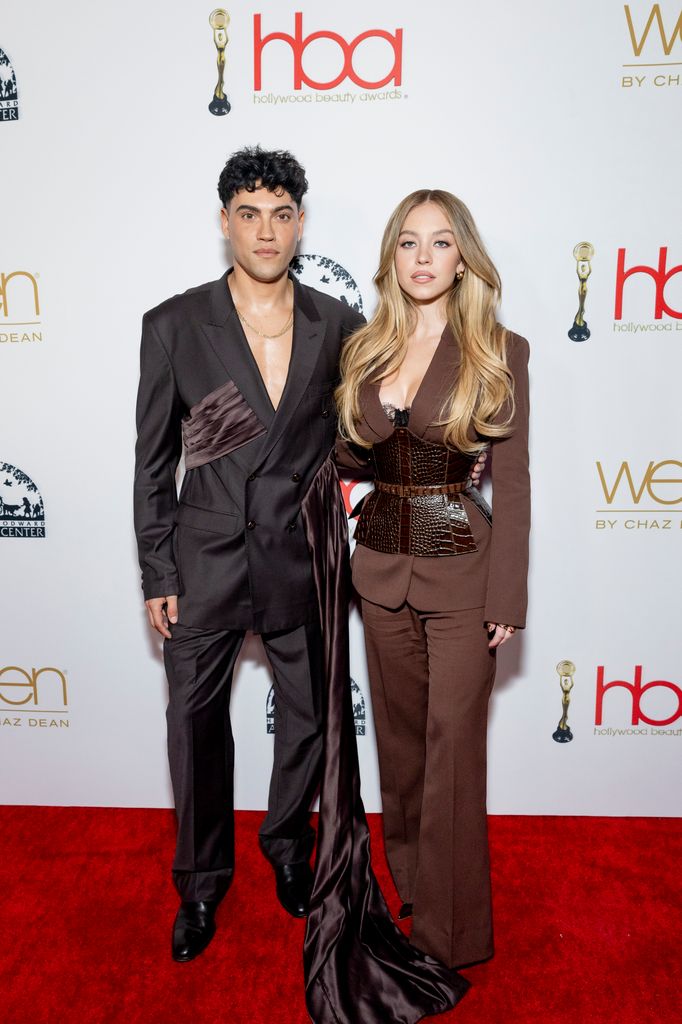  Glen Oropeza and Sydney Sweeney attend the 10th annual Hollywood Beauty Awards in Los Angeles matching in brown suits