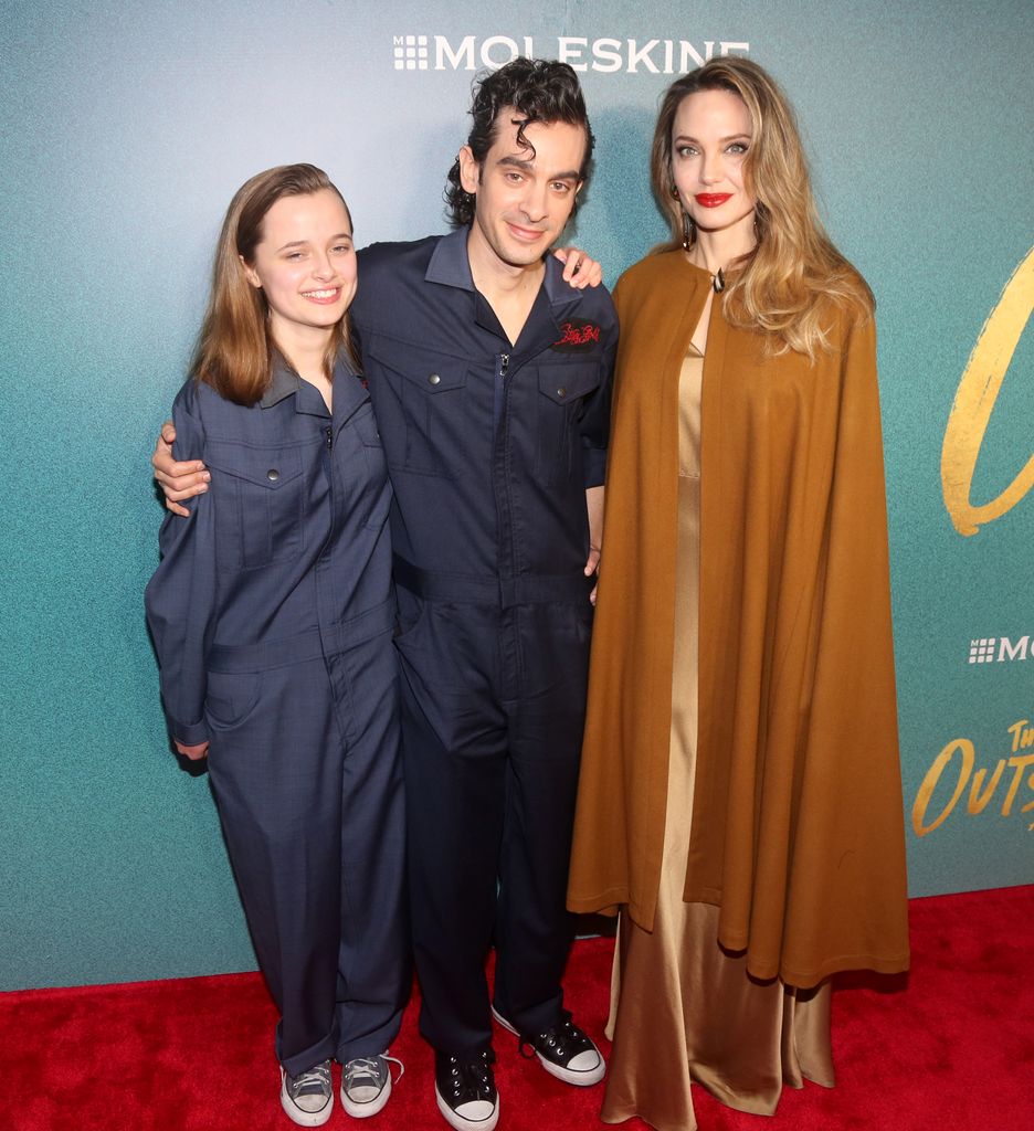 Vivienne Jolie-Pitt, Justin Levine and Angelina Jolie attend the opening night of "The Outsiders" at The Bernard B. Jacobs Theatre on April 11, 2024 in New York City.