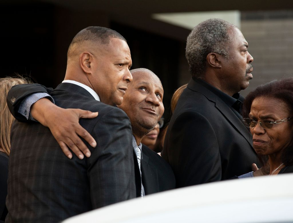 Clarence Franklin (center), son of soul music icon Aretha Franklin, mourns for his mother outside Greater Grace Temple at the end of her funeral August 31, 2018 in Detroit, Michigan