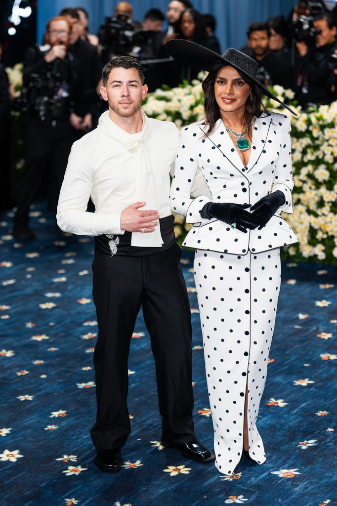 Nick Jonas (L) and Priyanka Chopra attend the 2025 Met Gala Celebrating "Superfine: Tailoring Black Style" at Metropolitan Museum of Art on May 05, 2025 in New York City. (Photo by TheStewartofNY/GC Images)